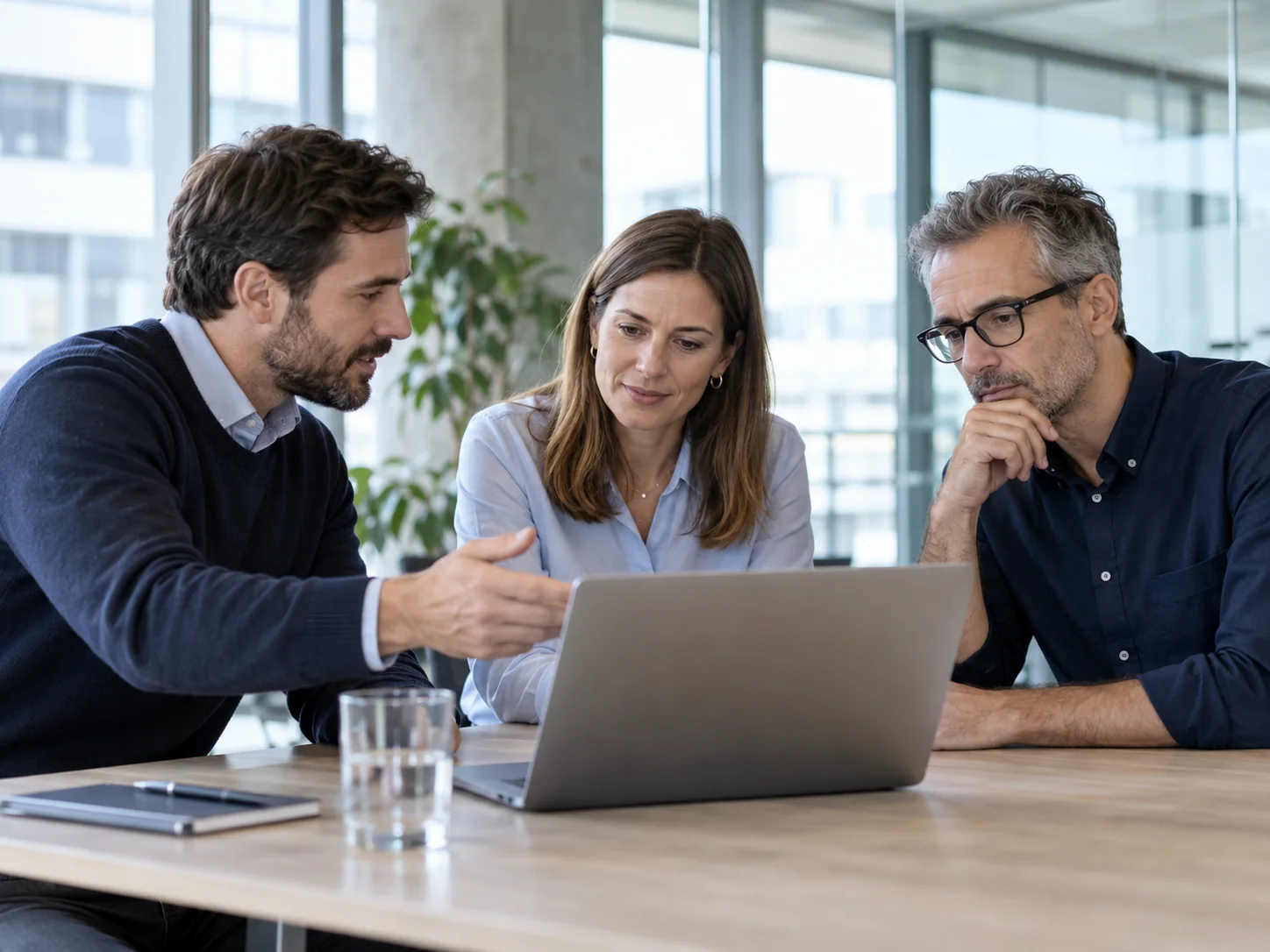 Illustrative consultants reviewing technology decisions